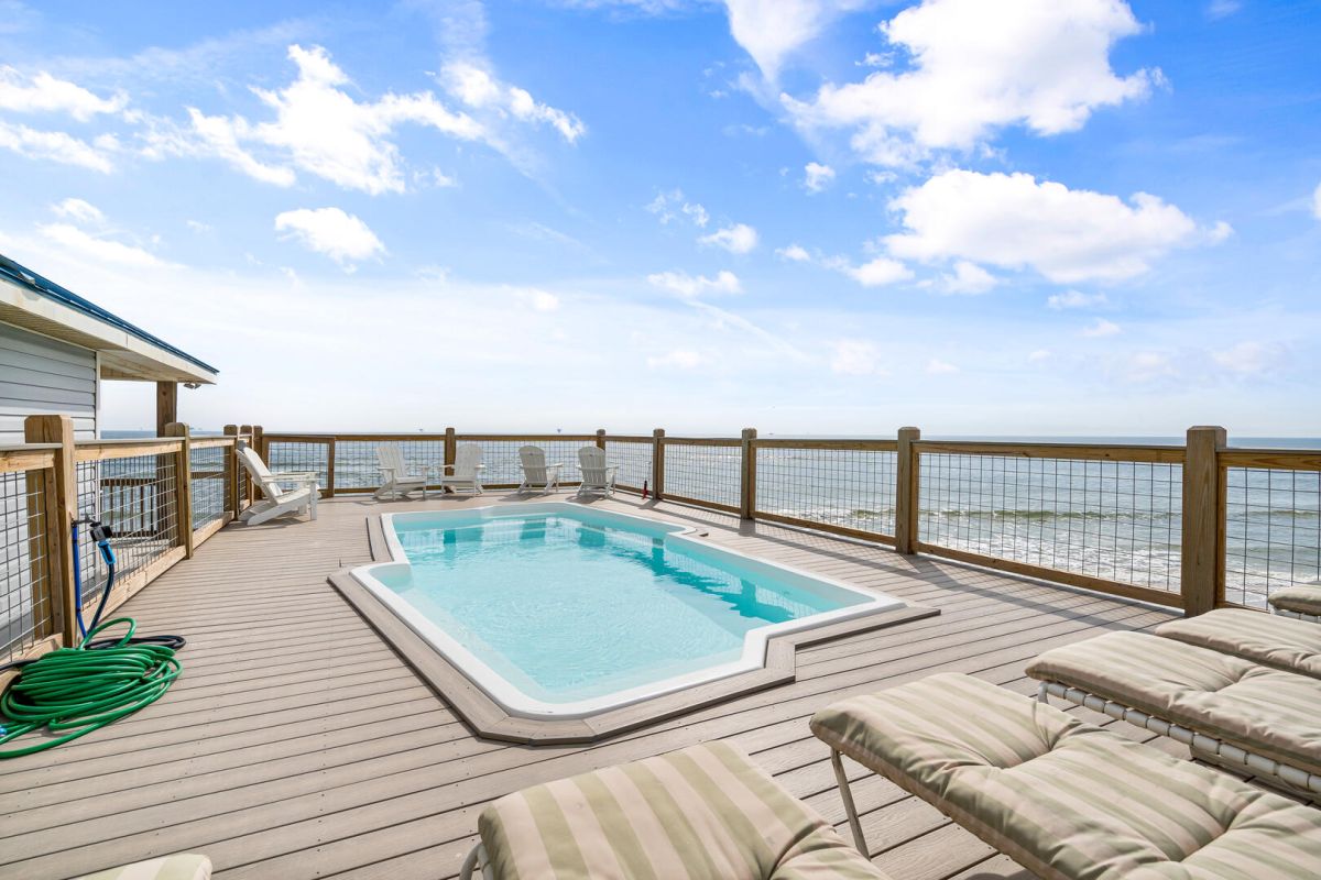 pool on porch overlooking ocean
